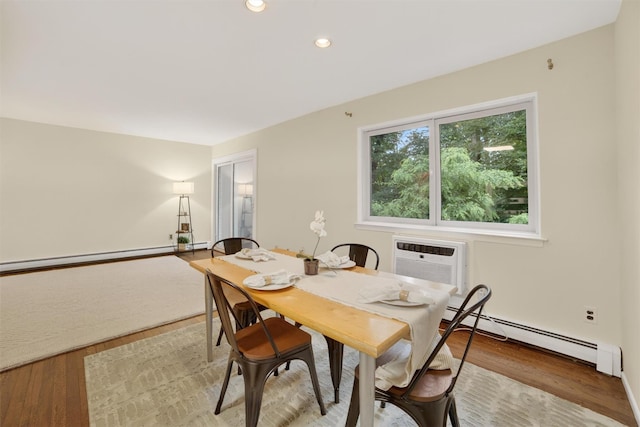 13 Scenic Unit J, Croton-On-Hudson, NY 10520 - dining space with baseboard heating, a wall mounted AC, light wood-type flooring, recessed lighting, and a baseboard heating unit