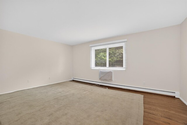 13 Scenic Unit J, Croton-On-Hudson, NY 10520 - spare room with a baseboard radiator and baseboards
