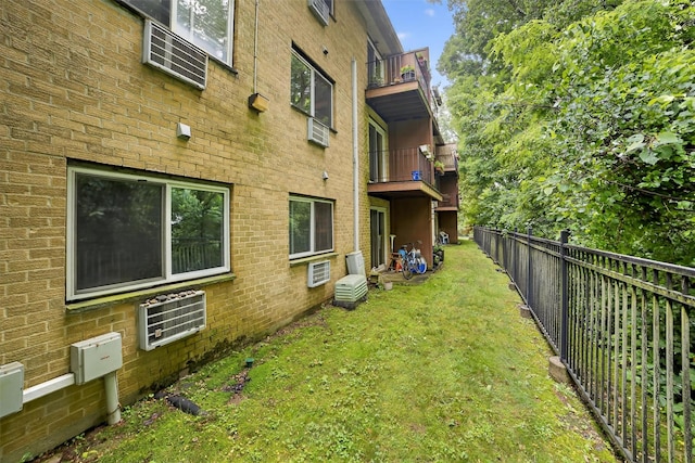 13 Scenic Unit J, Croton-On-Hudson, NY 10520 - view of yard with a balcony and an AC wall unit