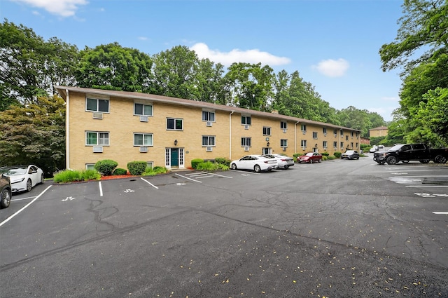 13 Scenic Unit J, Croton-On-Hudson, NY 10520 - view of building exterior featuring uncovered parking