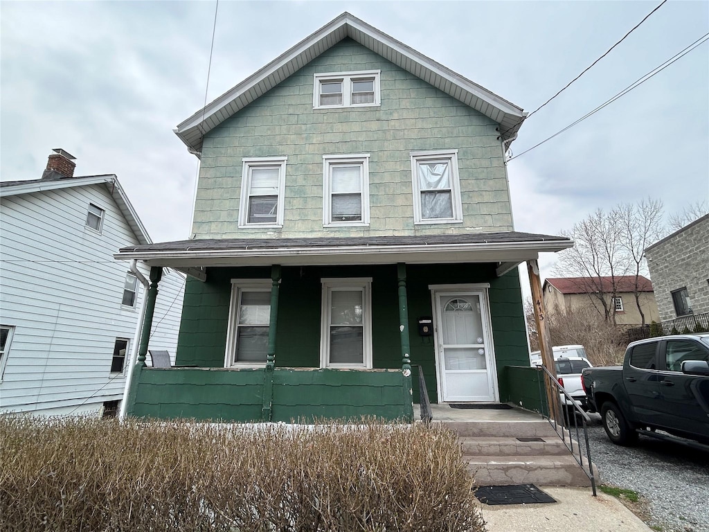413 Franklin St, Port Chester, NY 10573 - american foursquare style home featuring a porch