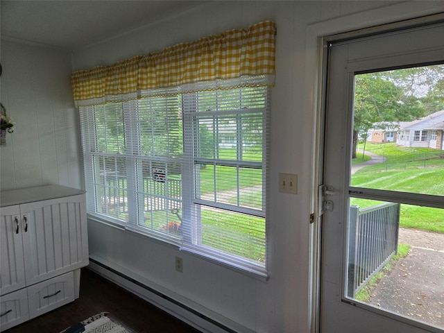 311 Woodbridge Dr Unit 311-C, Ridge, NY 11961 - entryway featuring plenty of natural light and a baseboard radiator