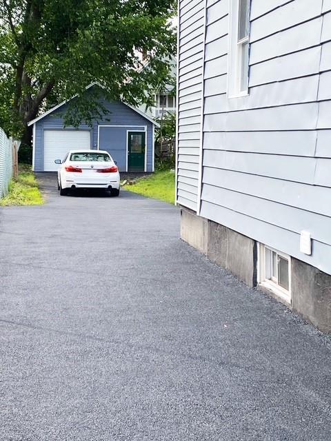 6 Elbert St, Call Listing Agent, NY 12304 - view of parking / parking lot with a garage