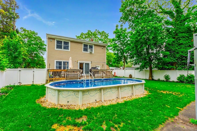 8 Division Ave, East Islip, NY 11730 - view of swimming pool with a gate, a fenced backyard, and a deck
