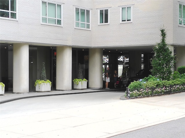 200 E 66th St Unit B1503, New York Manhattan, NY 10065 - doorway to property with brick siding