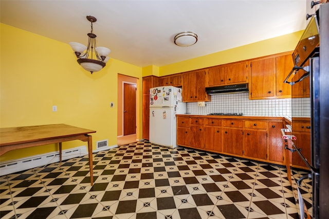 615 E Olive St, Long Beach, NY 11561 - kitchen with freestanding refrigerator, under cabinet range hood, a baseboard heating unit, black stovetop, and tasteful backsplash