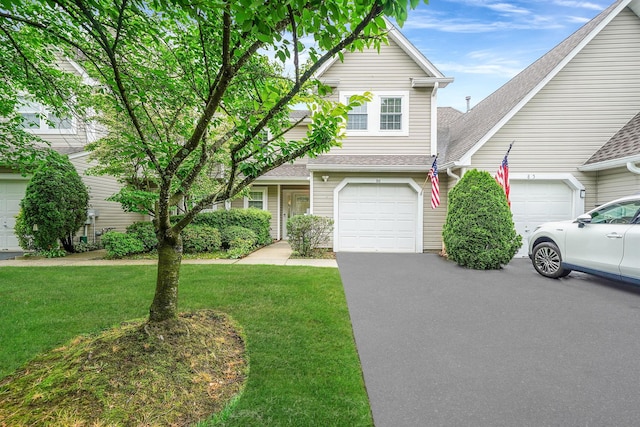 86 Erik Dr, East Setauket, NY 11733 - view of front of house featuring a front yard, roof with shingles, a garage, and driveway