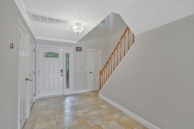 86 Erik Dr, East Setauket, NY 11733 - foyer entrance featuring stairway, light stone finish flooring, and ornamental molding