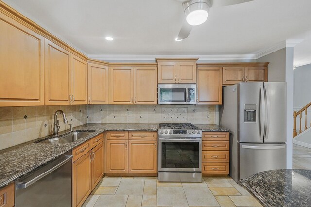 86 Erik Dr, East Setauket, NY 11733 - kitchen featuring stainless steel appliances, crown molding, dark stone countertops, and tasteful backsplash