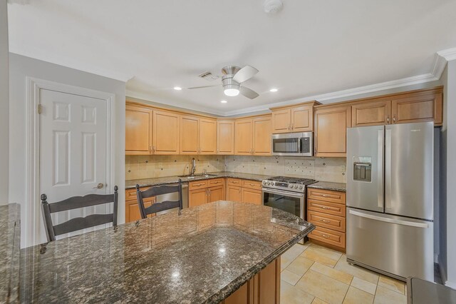 86 Erik Dr, East Setauket, NY 11733 - kitchen featuring stainless steel appliances, tasteful backsplash, ceiling fan, dark stone countertops, and recessed lighting
