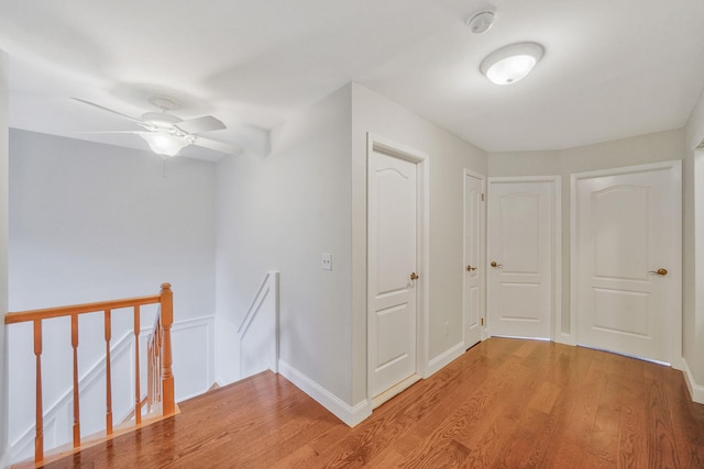 86 Erik Dr, East Setauket, NY 11733 - hallway featuring an upstairs landing and light wood finished floors