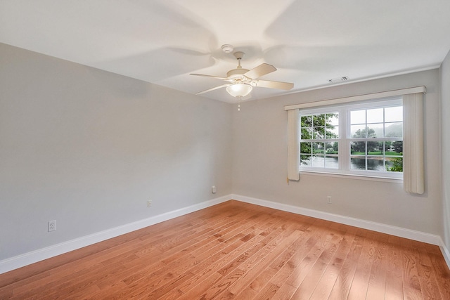 86 Erik Dr, East Setauket, NY 11733 - unfurnished room with light wood finished floors and ceiling fan