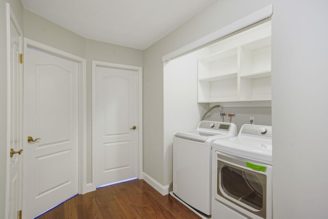 86 Erik Dr, East Setauket, NY 11733 - washroom with washer and dryer and dark wood finished floors