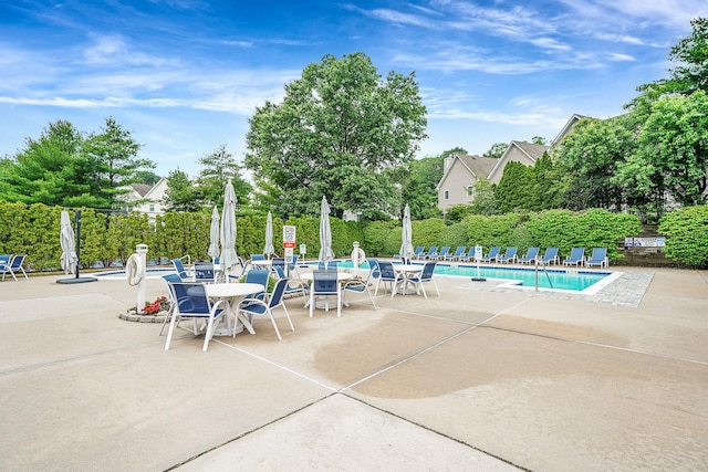 86 Erik Dr, East Setauket, NY 11733 - community pool with a patio area