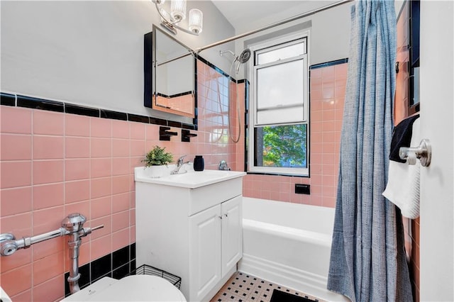 9707 4th Ave Unit 3R, Brooklyn, NY 11209 - bathroom with vanity, tile walls, and shower / bath combo with shower curtain