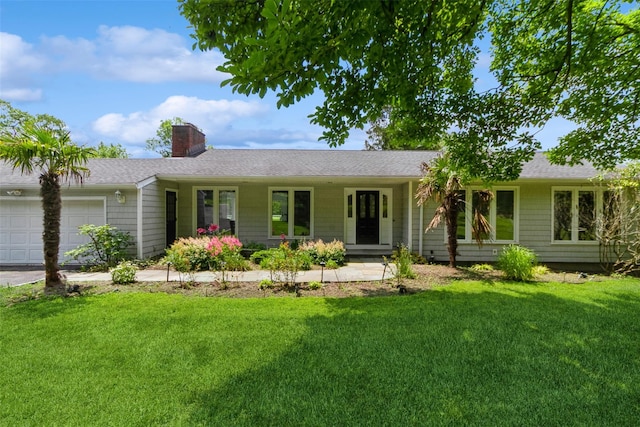 140 Old Farm Rd S, Pleasantville, NY 10570 - single story home featuring an attached garage, a chimney, a front lawn, and a shingled roof