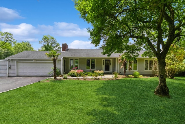 140 Old Farm Rd S, Pleasantville, NY 10570 - single story home featuring driveway, a garage, a chimney, a front yard, and a porch