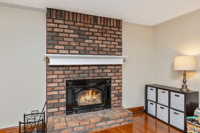 113 Pine St, Port Jefferson Station, NY 11776 - detailed view of wood finished floors, ornamental molding, and a fireplace