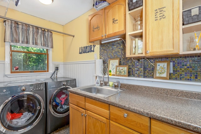 113 Pine St, Port Jefferson Station, NY 11776 - laundry area featuring washing machine and dryer, a wainscoted wall, and cabinet space