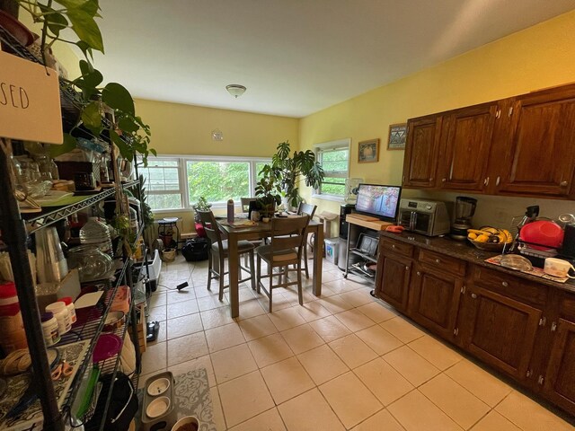 126 Tanglewylde Rd, Lake Peekskill, NY 10579 - dining room with light tile patterned flooring