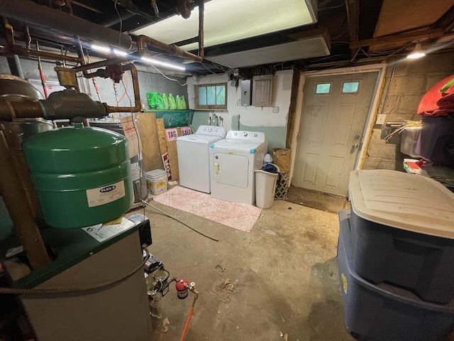 126 Tanglewylde Rd, Lake Peekskill, NY 10579 - basement with washing machine and dryer and electric panel