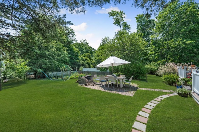 4 Cooks Ln, Westhampton, NY 11977 - view of yard featuring a patio area and an outdoor fire pit