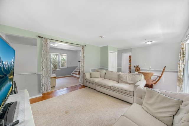 4 Cooks Ln, Westhampton, NY 11977 - living room featuring stairway and wood finished floors