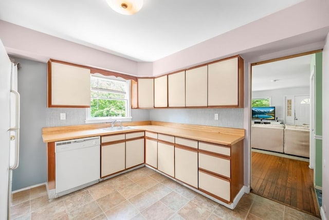 4 Cooks Ln, Westhampton, NY 11977 - kitchen featuring white appliances, light countertops, and cream cabinetry