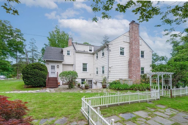 1146 N Ave, New Rochelle, NY 10804 - back of house with a chimney