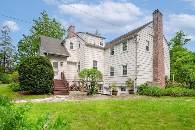 1146 N Ave, New Rochelle, NY 10804 - back of property with a chimney and a yard