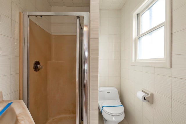 230 Mosher Ave, Woodmere, NY 11598 - bathroom featuring tile walls, plenty of natural light, and a stall shower