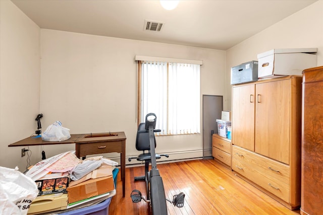230 Mosher Ave, Woodmere, NY 11598 - workout room featuring light wood-style flooring