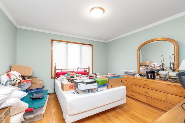 230 Mosher Ave, Woodmere, NY 11598 - bedroom with light wood finished floors and crown molding