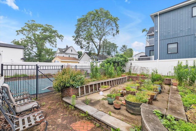 230 Mosher Ave, Woodmere, NY 11598 - fenced backyard with a vegetable garden