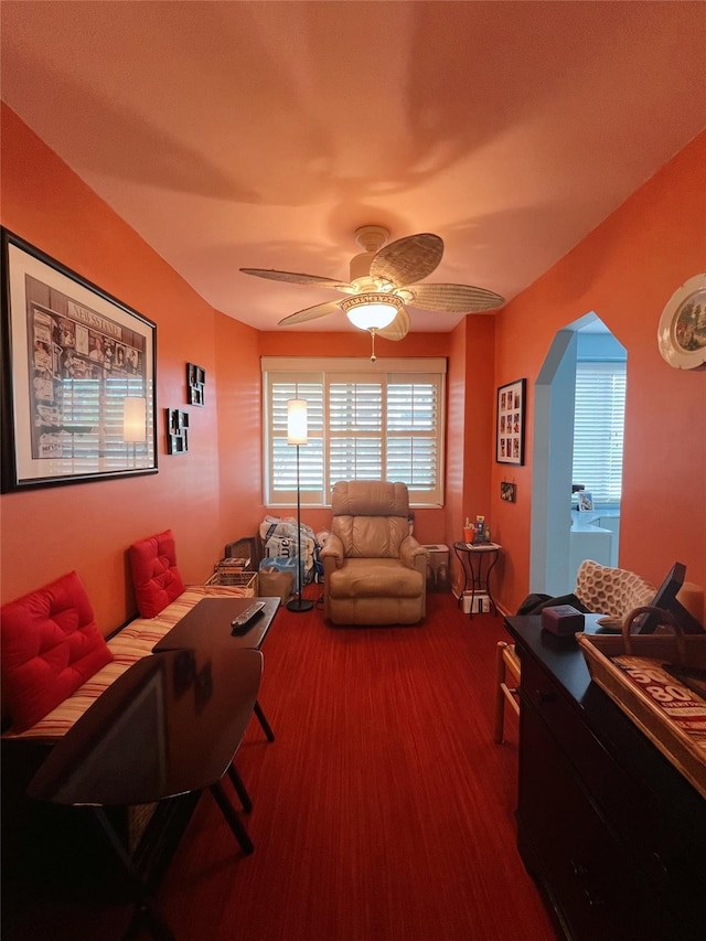 1815 215th St Unit 1G, Flushing, NY 11360 - living room with arched walkways, a ceiling fan, and carpet flooring