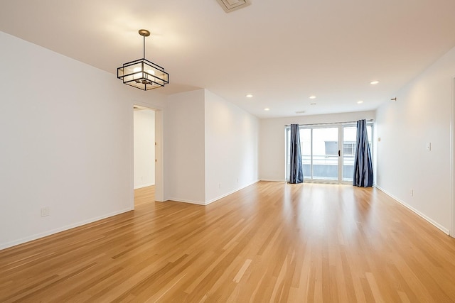100 Cuttermill Rd Unit 3E, Great Neck, NY 11021 - spare room with light wood-type flooring and recessed lighting