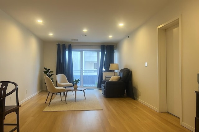 100 Cuttermill Rd Unit 3E, Great Neck, NY 11021 - sitting room with light wood finished floors and recessed lighting