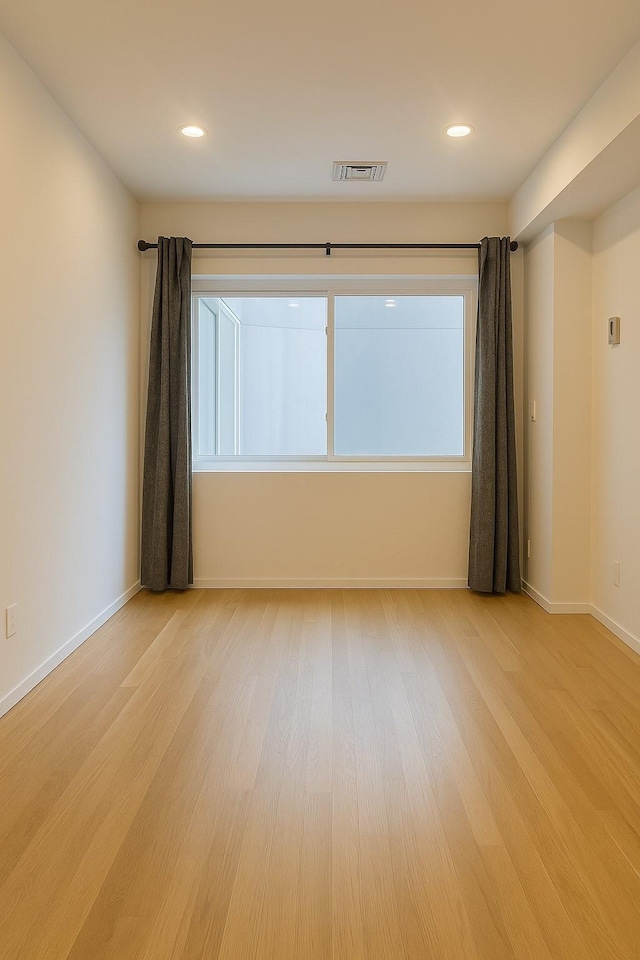 100 Cuttermill Rd Unit 3E, Great Neck, NY 11021 - empty room featuring light wood-type flooring and recessed lighting