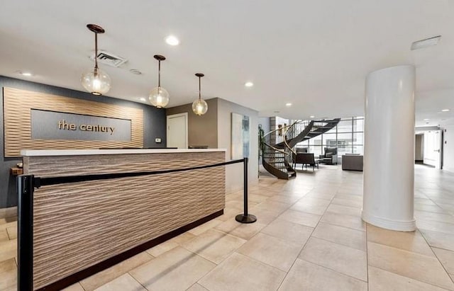 100 Cuttermill Rd Unit 3E, Great Neck, NY 11021 - reception area with decorative columns, stairs, and recessed lighting