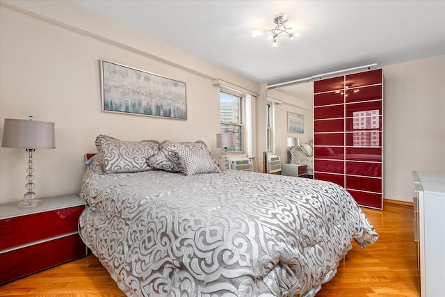 2928 W 5th St Unit 10P, Brooklyn, NY 11224 - bedroom featuring light wood-style flooring and cooling unit