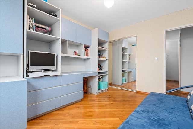 2928 W 5th St Unit 10P, Brooklyn, NY 11224 - bedroom with built in study area and light wood finished floors