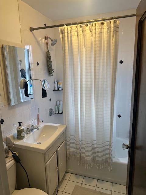 240 Alpine Pl Unit 2A, Eastchester, NY 10707 - full bath featuring shower / tub combo, vanity, tile patterned floors, and tasteful backsplash