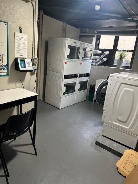 240 Alpine Pl Unit 2A, Eastchester, NY 10707 - basement with stacked washing machine and dryer and washing machine and clothes dryer
