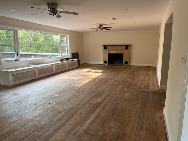 270 N Highland Ave, Pearl River, NY 10965 - unfurnished living room with hardwood / wood-style flooring, ceiling fan, and a fireplace