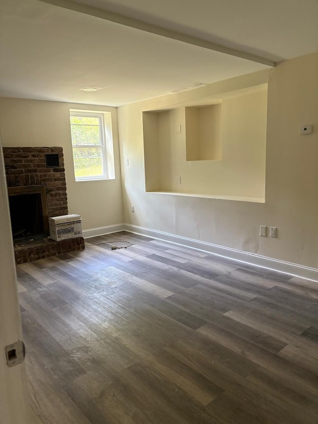 270 N Highland Ave, Pearl River, NY 10965 - unfurnished living room with wood finished floors and a fireplace