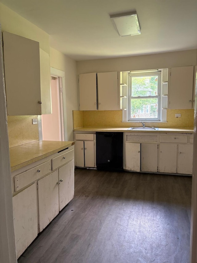 270 N Highland Ave, Pearl River, NY 10965 - kitchen with dishwasher, dark wood finished floors, light countertops, and white cabinetry