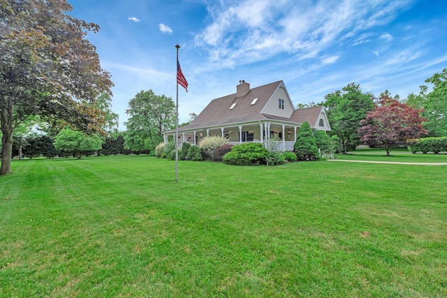 600 Shipyard Ln, East Marion, NY 11939 - view of side of property featuring a yard and a chimney