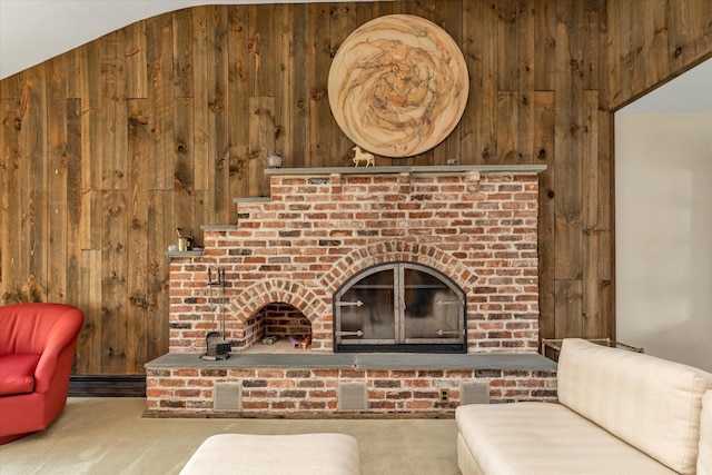 790 Adams St, Baldwin, NY 11510 - living room featuring wooden walls, carpet, and a fireplace