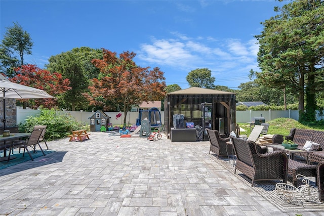 5 Fox Rd, Middle Island, NY 11953 - fenced backyard with a gazebo, a patio, and outdoor dining area
