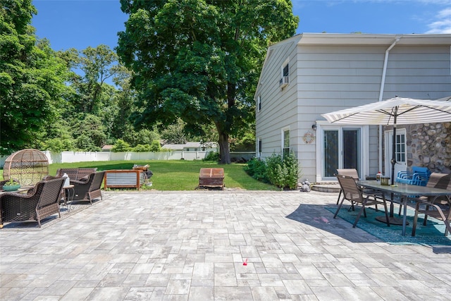 5 Fox Rd, Middle Island, NY 11953 - fenced backyard with outdoor dining area and a patio